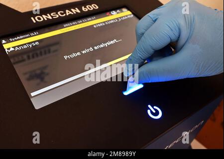 Bruchsal, Germany. 10th Jan, 2023. A swab containing a wipe sample of a letter from prisoners' mail is inserted into an ion scanner at Bruchsal Correctional Institution (JVA). The ion scanner can detect drugs present based on the sample. (to dpa 'Drug scanners' in prisons strike around 150 times') Credit: Uli Deck/dpa/Alamy Live News Stock Photo