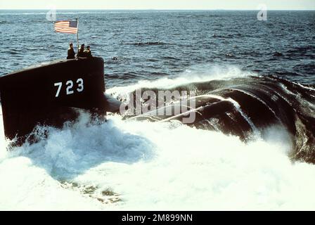 A starboard quarter view of the nuclear-powered attack submarine OKLAHOMA CITY (SSN-723) underway. Country: Unknown Stock Photo