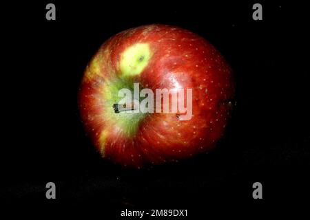 fresh sweet red apple isolated on black background Stock Photo