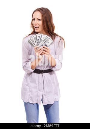 I cant wait to get spending. Casually dressed woman looking excited while holding a wad of cash - isolated on white. Stock Photo