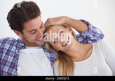 We couldnt be happier. a happily married couple at home. Stock Photo