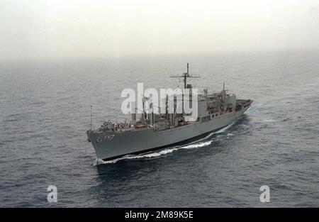 A port bow view of the combat stores ship USS SAN JOSE (AFS-7) underway. Country: Unknown Stock Photo