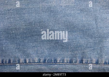 The texture of blue jeans Stock Photo