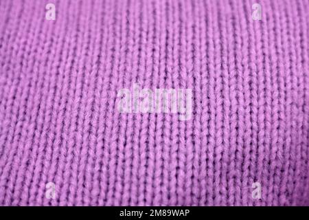 The texture of knit in violet color Stock Photo