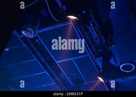 Spot lights in the dark, modern stage illumination equipment Stock Photo