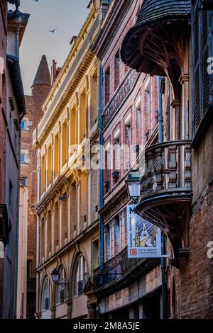 Wooden balcony of a medieval house in Tripiere street in Toulouse old town in the south of France (Haute Garonne) Stock Photo