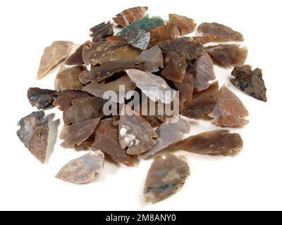 Stone Age Flint Stone Arrow Heads - Stone Arrows isolated on white Background Stock Photo
