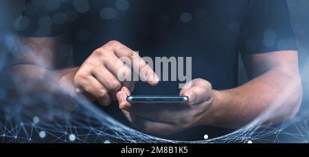 male hands with cell phone, smart phone, surrounded by virtual digital interface. Digital technology, internet network connection, big data, digital m Stock Photo