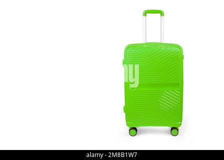Suitcase isolated on white. Green, fashionable travel suitcase on white background with shadow. Green travel luggage Stock Photo