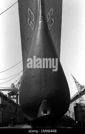 A close-up view of the bulbous, underwater portion of the bow of the battleship USS MISSOURI (BB-63), showing the ring for attaching minesweeping paravanes. The MISSOURI is in dry dock at the Long Beach Naval Shipyard while undergoing routine overhaul. State: California (CA) Country: United States Of America (USA) Stock Photo