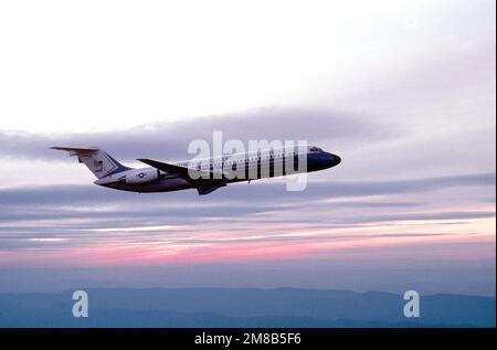 A right side view of a C-9C Nightingale aircraft from the 99th Military Airlift Squadron in flight. Country: Unknown Stock Photo