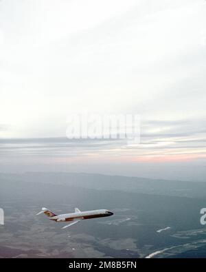 A right side view of a C-9C Nightingale aircraft from the 99th Military Airlift Squadron in flight. Country: Unknown Stock Photo