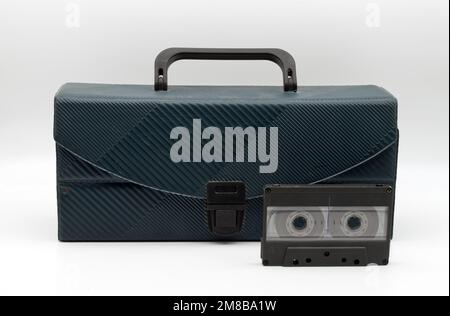 Vintage Audio Cassette Tape Case isolated on white background. Vintage technology concept. Stock Photo