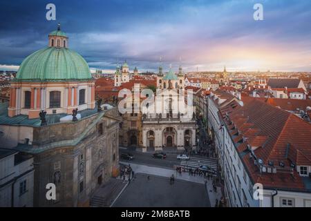 Aerial view of Krizovnicke Square with St. Francis of Assisi Church and St. Salvator Church at sunset - Prague, Czech Republic Stock Photo