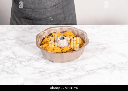 Chocolate pumpkin bundt cake with toffee glaze Stock Photo