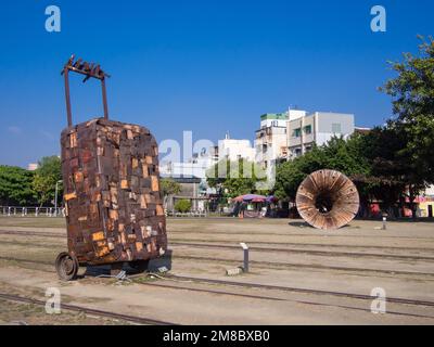 A huge metal suitcase on display at Pier-2 Art Center in Kaohsiung, Taiwan. Stock Photo