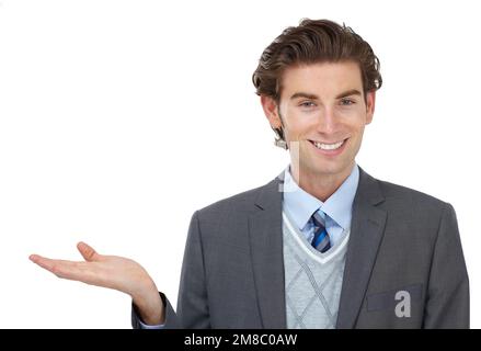Businessman, portrait and presenting studio mockup space, isolated white background and advertising. Happy guy, presentation and choice on mock up Stock Photo