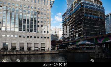 London - 01 26 2022: view of Canary Wharf tube station with building under construction Stock Photo