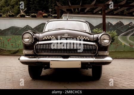 Sairme, Georgia, 06.06.21. GAZ M21 Volga, third series model, view the front of the car, luxury old black car on a street in Sairme. Stock Photo