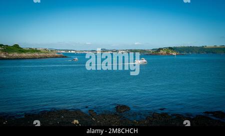 15th July 2021 - Mount Edgcumbe, UK: View across the busy water towards Plymouth from Mount Edgcumbe Country Park, Cornwall, UK Stock Photo