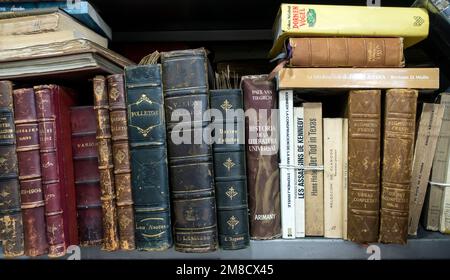 Old Spanish-language books on shelf Stock Photo