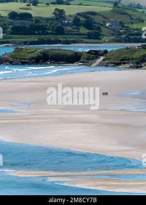 Inchydoney beach at low tide, sunny day. The famous Irish beach on the south coast of the country. Seaside landscape. Stock Photo