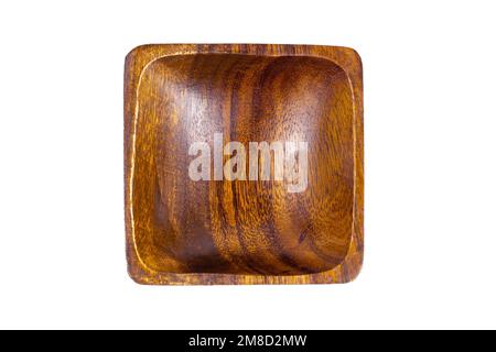 Top view of empty brown square wooden bowl isolated on white background close up. Stock Photo