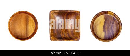 Top view of empty brown square and round wooden bowls set isolated on white background close up. Stock Photo