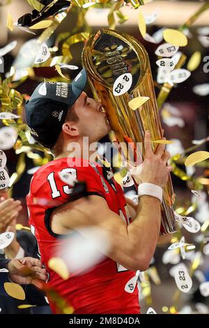 Inglewood, CA. 9th Jan, 2023. Georgia Bulldogs quarterback Stetson Bennett (13) kisses the trophy overhead after winning the College Football Playoff National Championship game between the TCU Horned Frogs and the Georgia Bulldogs on January 9, 2023 at SoFi Stadium in Inglewood, CA. (Mandatory Credit: Freddie Beckwith/MarinMedia.org/Cal Sport Media) (Absolute Complete photographer, and credits required).Television, or For-Profit magazines Contact MarinMedia directly. Credit: csm/Alamy Live News Stock Photo