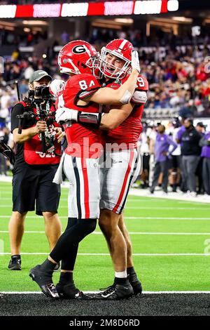 Inglewood, CA. 9th Jan, 2023. Georgia Bulldogs wide receiver Ladd McConkey (84) is congratulated by Georgia Bulldogs tight end Brock Bowers (19) during the College Football Playoff National Championship game between the TCU Horned Frogs and the Georgia Bulldogs on January 9, 2023 at SoFi Stadium in Inglewood, CA. (Mandatory Credit: Freddie Beckwith/MarinMedia.org/Cal Sport Media) (Absolute Complete photographer, and credits required).Television, or For-Profit magazines Contact MarinMedia directly. Credit: csm/Alamy Live News Stock Photo