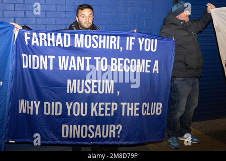 Everton fan’s protest showing flag saying “Farad Morshiri, If you didn’t want to become a museum, why did you keep the club dinosaur?” during the Everton fan’s protest at Goodison Park, Liverpool, United Kingdom, 13th January 2023  (Photo by Phil Bryan/Alamy Live News) Stock Photo