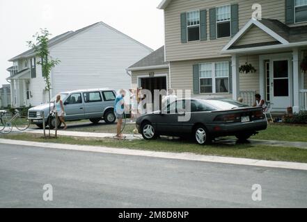 A military family enjoys quarters completed in January of 1989. Base: Seneca Army Depot, Romulus State: New York (NY) Country: United States Of America (USA) Stock Photo