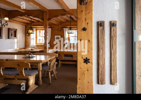 View from the entrance to the restaurant hall of the Austrian mountain hut Stock Photo