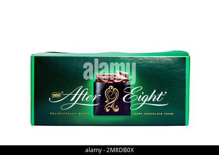 DUSHANBE, TAJIKISTAN - SEPTEMBER 12, 2022: Green box package of mint dark chocolate thins After Eight isolated on white background close up. Stock Photo
