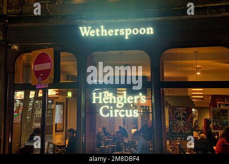 Glasgow, Scotland, UK 13th January, 2023. UK Weather: The Hengler's Circus - JD Wetherspoon Wet and windy saw  late night shopping in sauchiehall street in the city centre. Credit Gerard Ferry/Alamy Live News Stock Photo