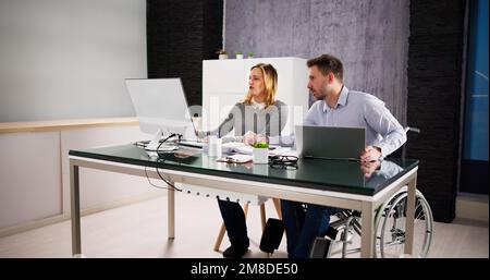 Two Analyst People Working On Computer In Office Stock Photo