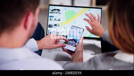 Couple Family Searching Real Estate Property Or House Online Stock Photo