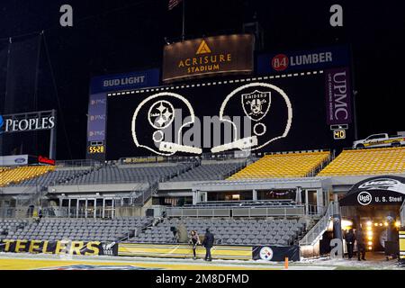 1972-style graphics on the scoreboard at Acrisure Stadium celebrate the  50th anniversary of the Immaculate Reception before an NFL football game  between the Pittsburgh Steelers and the Las Vegas Raiders in Pittsburgh