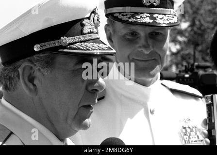 ADM Gennadiy Khvatov, commander, Soviet Pacific Fleet, and ADM Charles R. Larson, left, commander in chief, U.S. Pacific Fleet, converse following a wreath-laying ceremony at Fort Rosecrans National Cemetery. Three ships of the Soviet Pacific Fleet are in San Diego for a five-day goodwill visit. Base: San Diego State: California (CA) Country: United States Of America (USA) Stock Photo