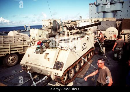 A U.S. Army M-163 Vulcan self-propelled anti-aircraft gun is secured aboard the rapid-response vehicle cargo ship USNS REGULUS (T-AKR-292). The gun, along with other equipment, is being transported to Saudi Arabia in support of Operation Desert Shield. Subject Operation/Series: DESERT SHIELD Country: Unknown Stock Photo