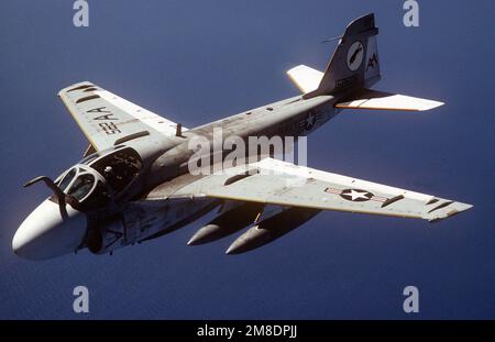 An Attack Squadron 35 (VA-35) KA-6D Intruder aircraft flies over the sea during Operation Desert Shield. VA-35 is based aboard the aircraft carrier USS SARATOGA (CV-60). Subject Operation/Series: DESERT SHIELD Country: Red Sea Stock Photo