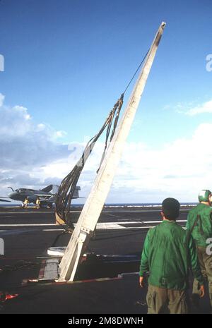 The crash barricade is raised on the flight deck during a drill aboard the nuclear-powered aircraft carrier USS ABRAHAM LINCOLN (CVN-72). Country: Caribbean Sea Stock Photo