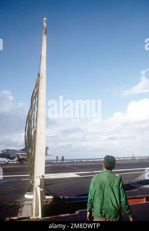 The crash barricade is raised on the flight deck during a drill aboard the nuclear-powered aircraft carrier USS ABRAHAM LINCOLN (CVN-72). Country: Caribbean Sea Stock Photo