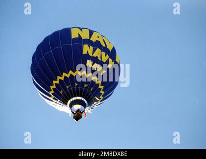 A U.S. Navy hot air balloon takes part in a race. Country: Unknown Stock Photo