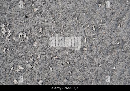 Dark gray grunge cement wall texture as abstract background. Stock Photo