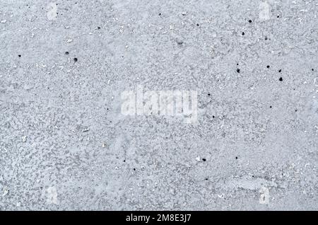 Natural gray grunge cement wall texture. Can be used as an abstract background with copy space. Stock Photo