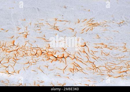 Old painted rusty metal, surface corrosion as a grunge texture or background. Stock Photo