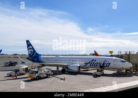 Alaska Airlines Boeing 737 MAX 9 airplane registration number N975AK parked at Daniel K. Inouye International Airport - Honolulu, Hawaii, USA - 2022 Stock Photo