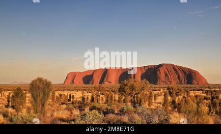 399 View of Uluru-Ayers Rock in the early morning under an almost clear sky. NT-Australia. Stock Photo