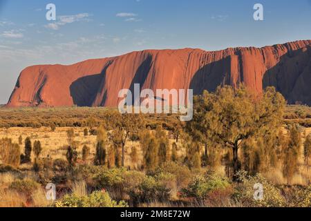 400 Partial view of Uluru-Ayers Rock in the early morning under an almost clear sky. NT-Australia. Stock Photo